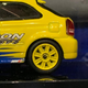 Illustration for article titled 1/64 Tarmac Works Hobby 64 - Honda Civic Type R EK9 w/Spoon livery